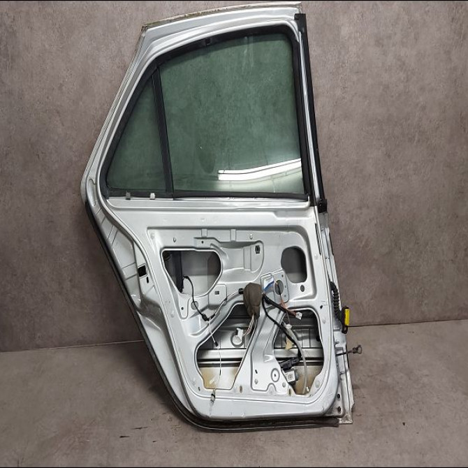 Porte arrière gauche occasion RENAULT LAGUNA II Phase 2 03-2005->09-2007 1.9 DCI 130ch 7751472439 2