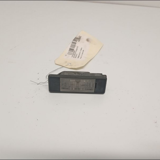 Eclaireur plaque de police d occasion NISSAN NOTE I Phase 1 03-2006->03-2009 1.4i 88ch 26510AU300 1