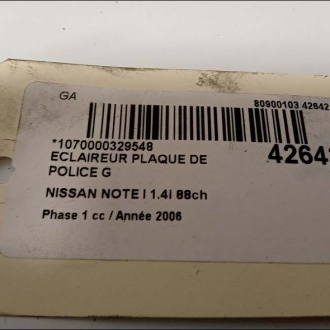 Eclaireur plaque de police g occasion NISSAN NOTE I Phase 1 03-2006->03-2009 1.4i 88ch 26510AU300 2