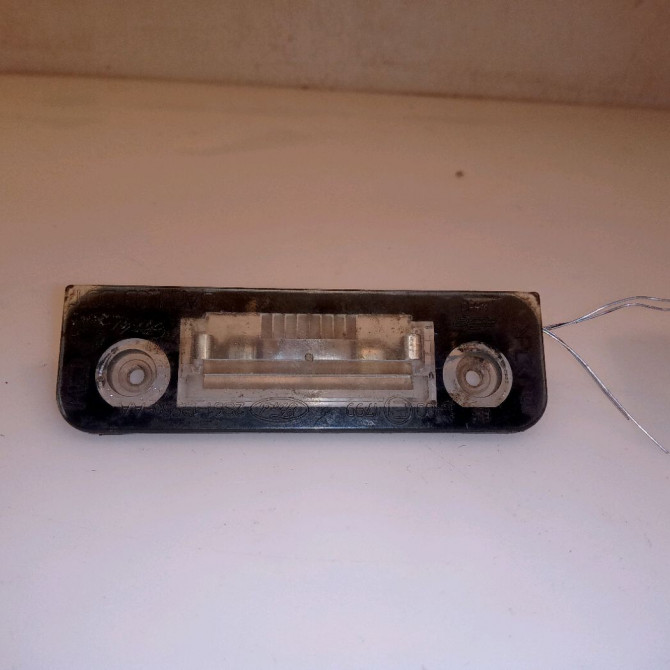 Eclaireur plaque de police g occasion FORD FIESTA V Phase 1 09-2002->10-2005 1.4 TDCI 1332916 1