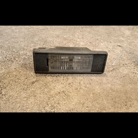 Eclaireur plaque de police g occasion NISSAN NOTE I phase 2 03-2009->02-2014 1.5 DCI 86ch