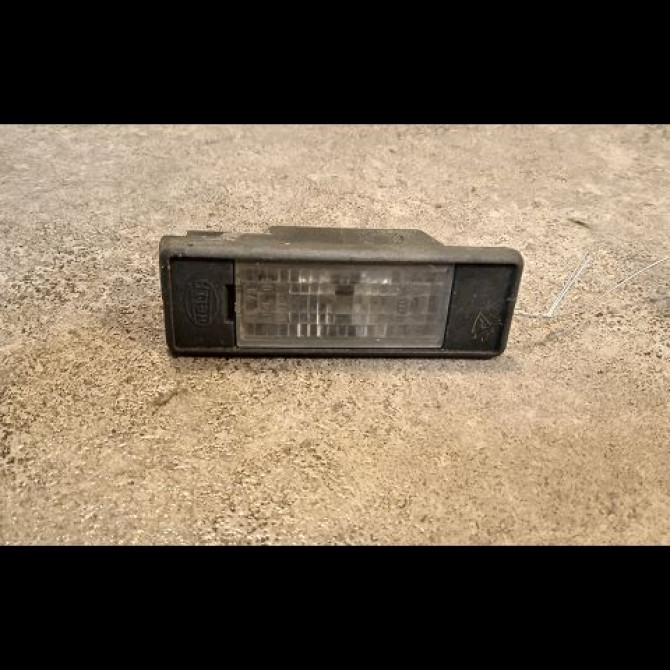 Eclaireur plaque de police g occasion NISSAN NOTE I phase 2 03-2009->02-2014 1.5 DCI 86ch 1