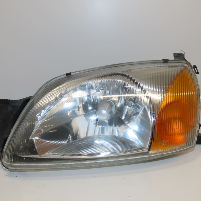 Phare gauche occasion FORD COURRIER IV Phase 1 04-1995->04-1999 1.8 D 60ch 1127897 1