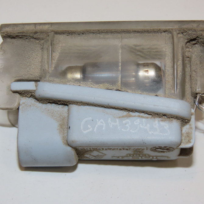 Eclaireur plaque de police d occasion RENAULT MEGANE II Phase 1 09-2003->12-2005 1.9 DCI 120ch 7700796163 2