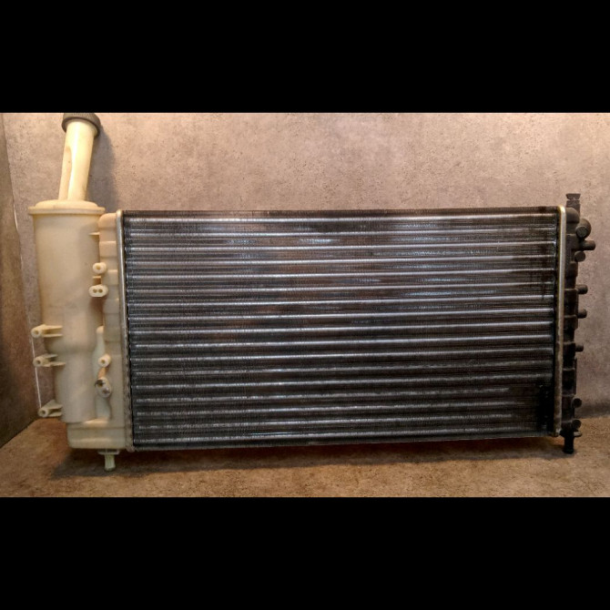 Radiateur occasion FIAT PUNTO II Phase 2 05-2003->10-2009 1.2i 60ch 51724183 2