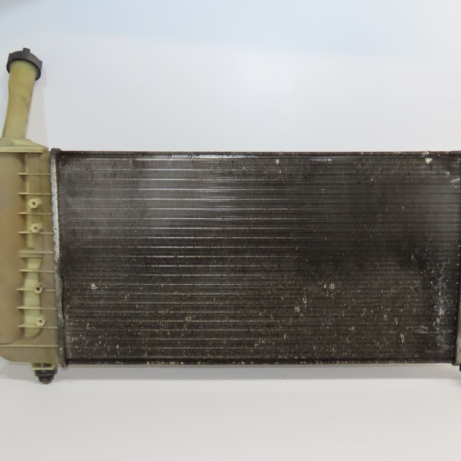 Radiateur occasion FIAT PUNTO II Phase 2 05-2003->10-2009 1.2i 60ch 51724183 2