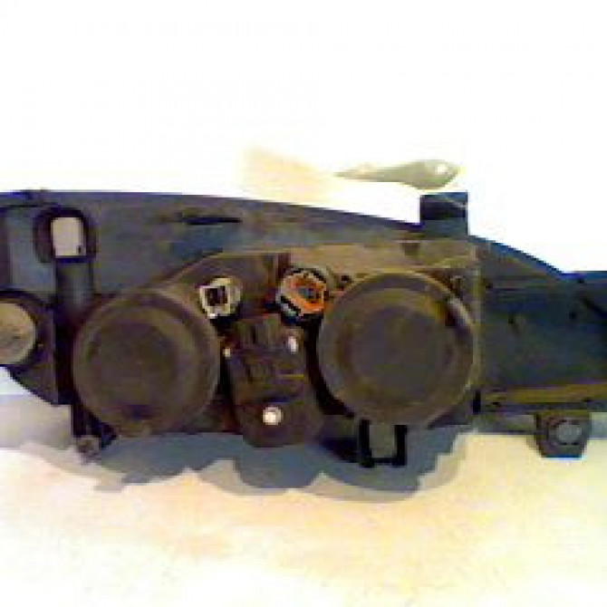 Phare gauche occasion NISSAN PRIMERA II Phase 1 10-1996->09-1999 260609F686 2