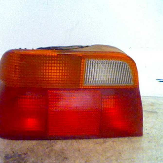 Feu arrière gauche occasion FORD ESCORT IV 1