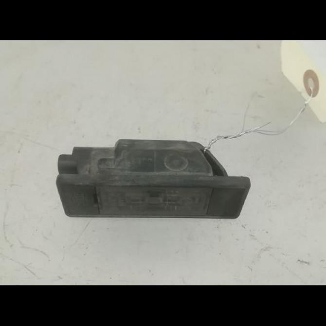 Eclaireur plaque de police d occasion NISSAN NOTE I phase 2 03-2009->02-2014 1.5 DCI 86ch 26510AU300 1