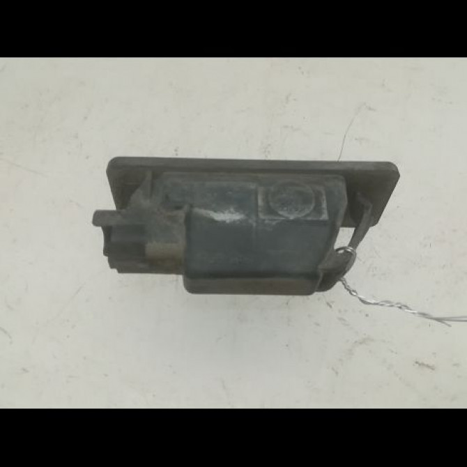 Eclaireur plaque de police d occasion NISSAN NOTE I phase 2 03-2009->02-2014 1.5 DCI 86ch 26510AU300 2