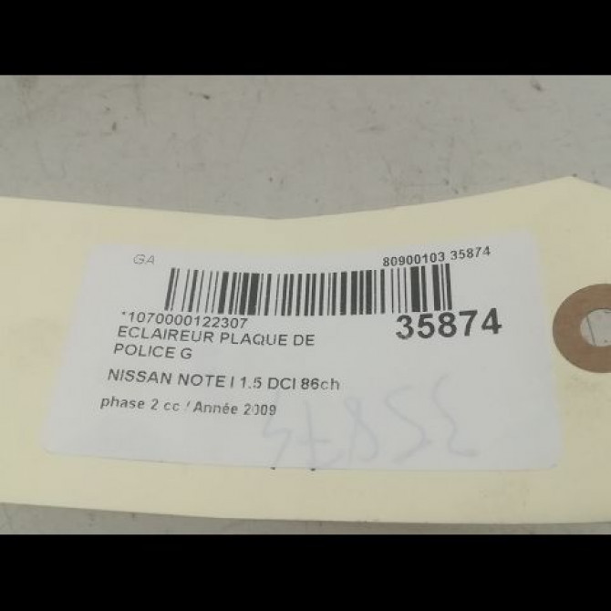 Eclaireur plaque de police g occasion NISSAN NOTE I phase 2 03-2009->02-2014 1.5 DCI 86ch 26510AU300 3