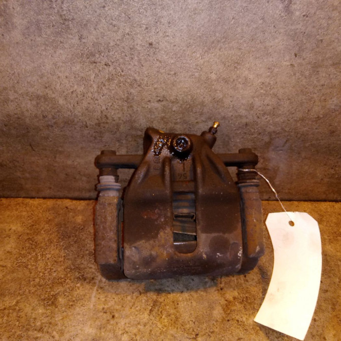 Etrier de frein avant gauche occasion NISSAN NOTE I Phase 1 03-2006->03-2009 1.4i 88ch 41011AX60A 1