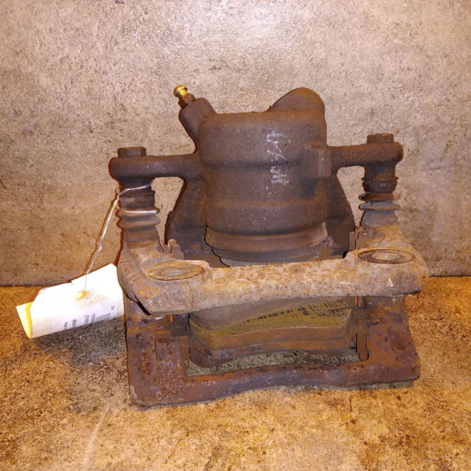 Etrier de frein avant gauche occasion NISSAN NOTE I Phase 1 03-2006->03-2009 1.4i 88ch 41011AX60A 2