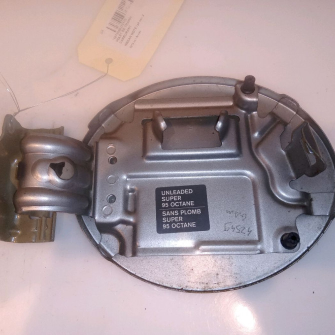 Volet de trappe carburant occasion NISSAN NOTE I phase 2 03-2009->02-2014 788309U01A 2