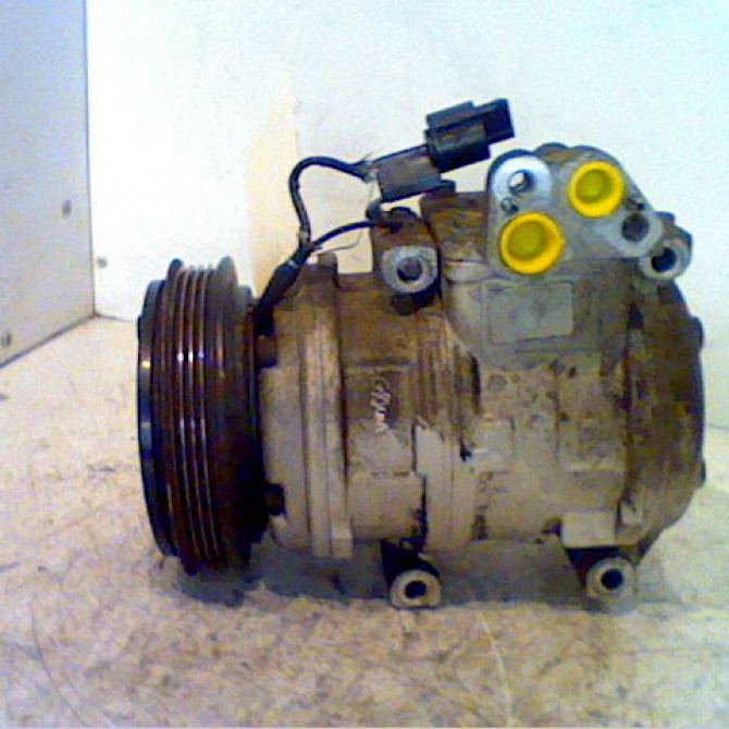 Compresseur air conditionne occasion KIA CARNIVAL I phase 1 07-1999->06-2006 0K56E61450 2