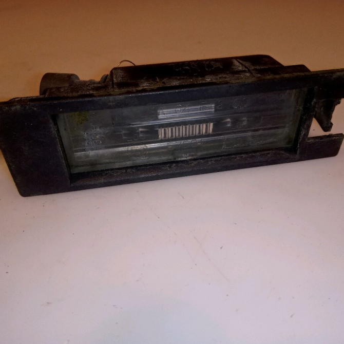 Eclaireur plaque de police d occasion OPEL CORSA IV Phase 1 09-2006->12-2010 1.2 TWINPORT 80ch 13251936 1