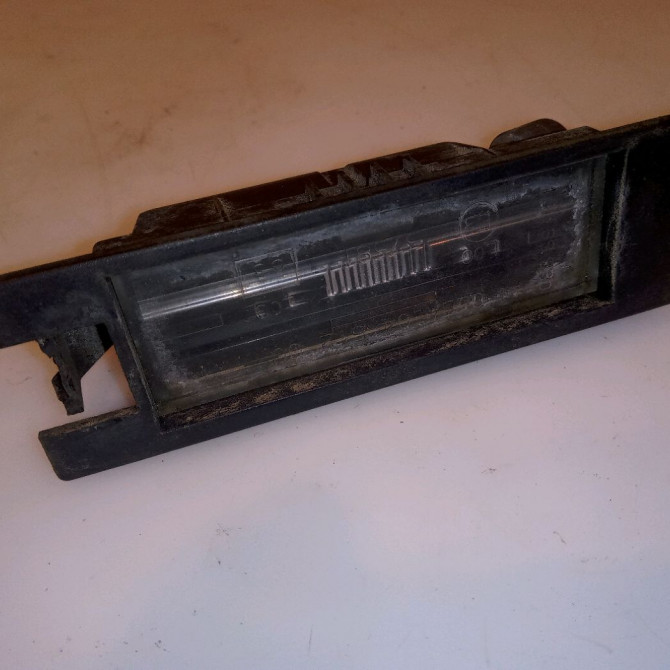 Eclaireur plaque de police g occasion OPEL CORSA IV Phase 1 09-2006->12-2010 1.2 TWINPORT 80ch 13251936 1