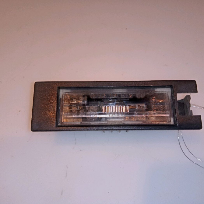 Eclaireur plaque de police d occasion OPEL ASTRA III Phase 2 01-2007->04-2011 1.7 CDTI 110ch 13251936 1