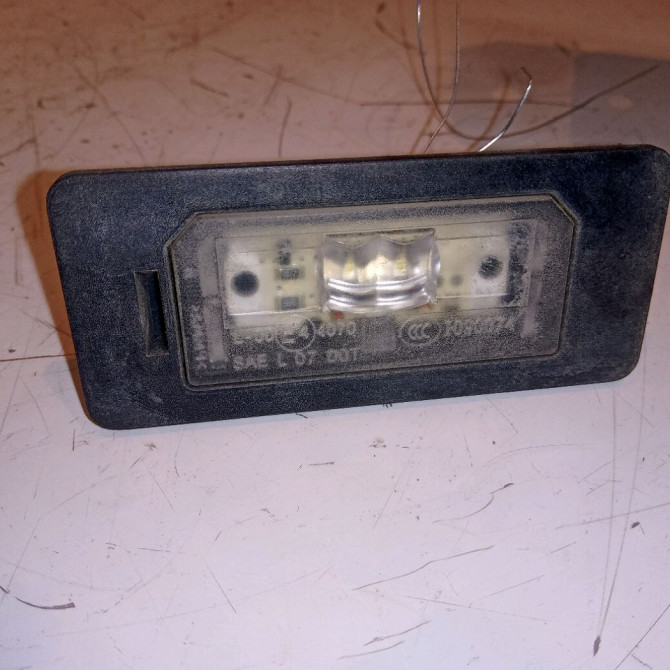 Eclaireur plaque de police d occasion B.M.W. SERIE 3 V Phase 2 09-2008->12-2011 318d 63267193293 1