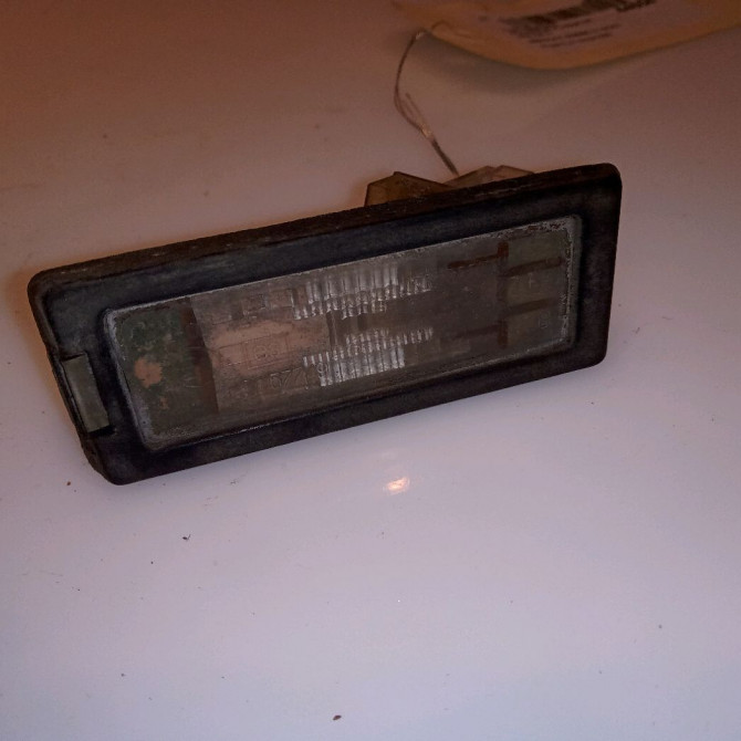 Eclaireur plaque de police d occasion RENAULT SCENIC II Phase 2 09-2006->04-2009 1.5 DCI 105ch 8200013577 1