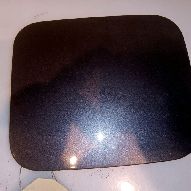 Volet de trappe carburant occasion TOYOTA PRIUS II 7735047020 1